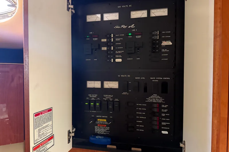 Fox Den Yacht Photos Pics Electrical control panel of a 2001 Sea Ray 380 Sundancer boat.