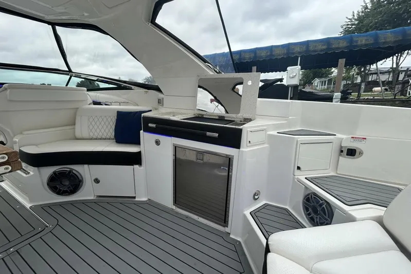  Yacht Photos Pics 2020 Sea Ray 350 SLX boat interior with seating, grill, and modern amenities.