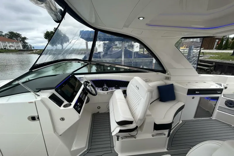  Yacht Photos Pics 2020 Sea Ray 350 SLX boat interior with modern helm and luxurious seating.