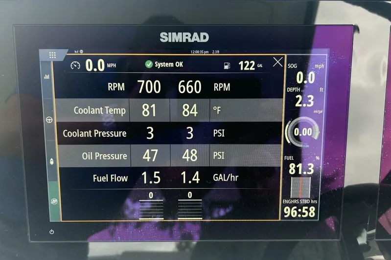  Yacht Photos Pics Simrad display showing Sea Ray 350 SLX engine metrics: RPM, coolant, oil pressure, fuel flow.