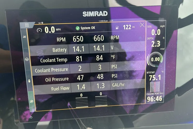  Yacht Photos Pics Simrad display showing Sea Ray 350 SLX engine metrics: RPM, battery, coolant, oil pressure.