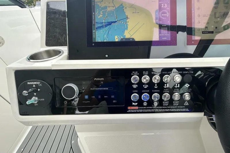  Yacht Photos Pics Control panel of a 2020 Sea Ray 350 SLX boat with navigation display.