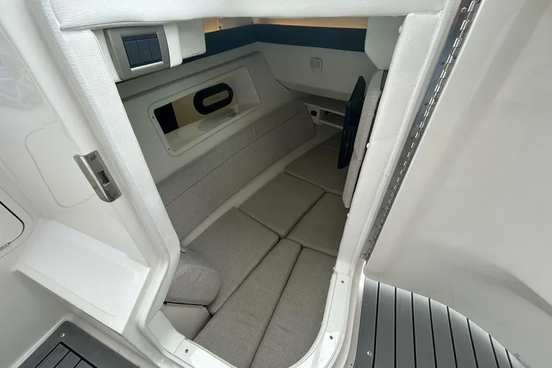  Yacht Photos Pics 2020 Sea Ray 350 SLX cabin interior with cushioned seating and modern design.
