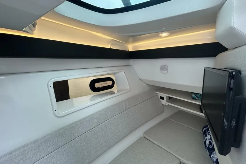  Yacht Photos Pics Interior cabin of 2020 Sea Ray 350 SLX with modern design and cozy seating.