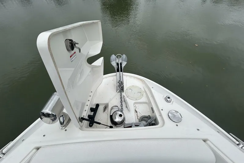  Yacht Photos Pics Open anchor compartment on 2020 Sea Ray 350 SLX boat, showing anchor and storage.