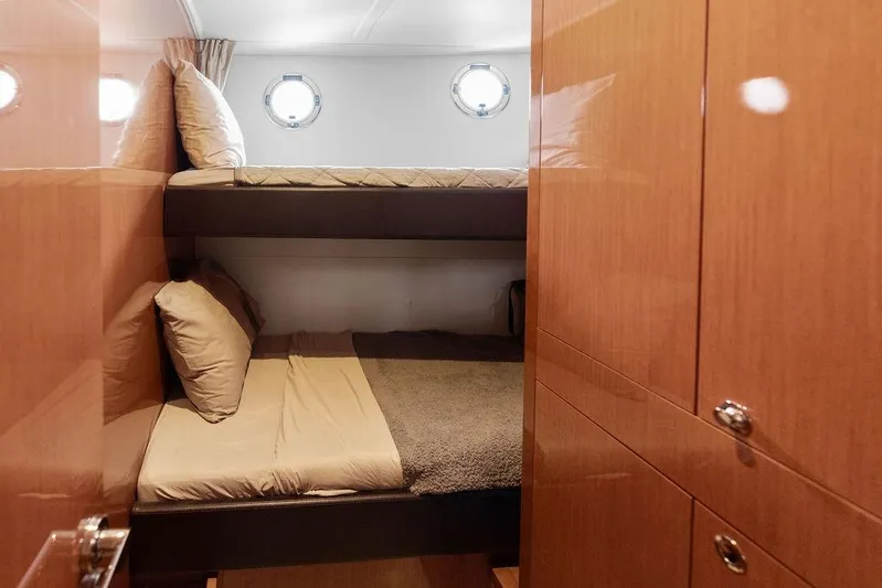 Dreamscape Yacht Photos Pics Cozy cabin with bunk beds in 2020 Beneteau Swift Trawler 50 yacht.