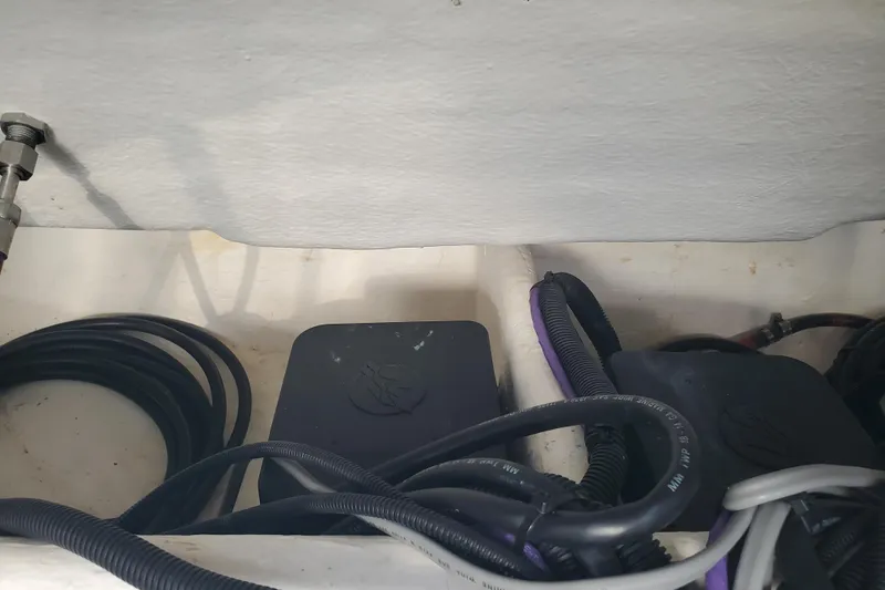  Yacht Photos Pics 2021 Beneteau Flyer 10 engine compartment with cables and components.