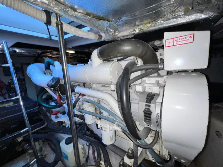  Yacht Photos Pics Engine room of 2003 Sea Ray 460 Sundancer yacht, showcasing mechanical components.