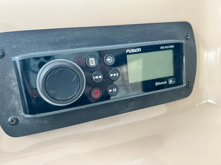  Yacht Photos Pics Fusion MS-RA70N stereo system on 2003 Sea Ray 460 Sundancer boat dashboard.