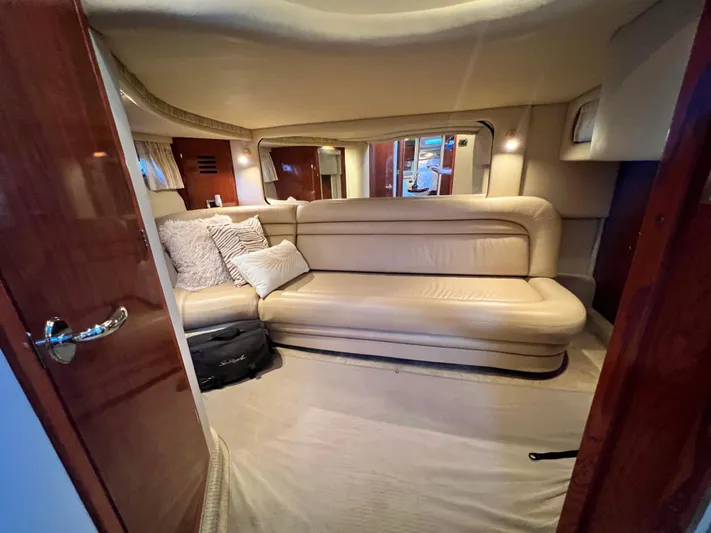  Yacht Photos Pics Luxurious interior of 2003 Sea Ray 460 Sundancer yacht with beige leather seating.
