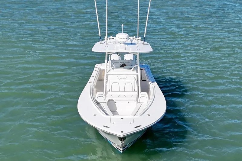  Yacht Photos Pics 2016 Regulator 28 Forward Seating boat on calm blue water.