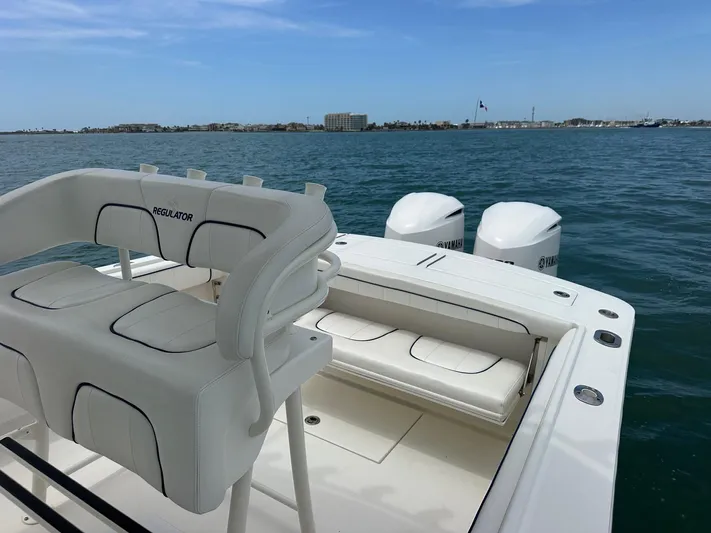  Yacht Photos Pics 2016 Regulator center console boat with Yamaha engines on open water.