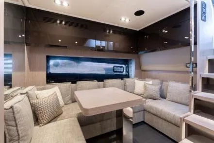  Yacht Photos Pics Luxurious interior of 2019 Azimut Atlantis 51 yacht with modern seating and elegant decor.