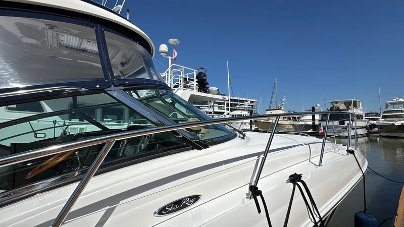  Yacht Photos Pics 2007 Sea Ray 400 Sundancer yacht docked at marina under clear blue sky.