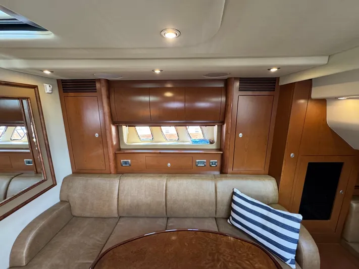  Yacht Photos Pics Luxurious interior of 2007 Sea Ray 400 Sundancer yacht with elegant wood cabinetry.
