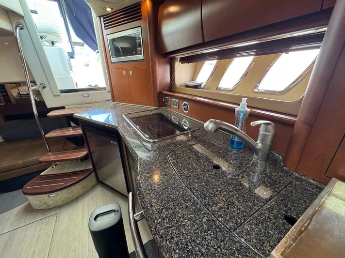  Yacht Photos Pics Luxurious 2007 Sea Ray 400 Sundancer yacht interior with modern kitchen amenities.