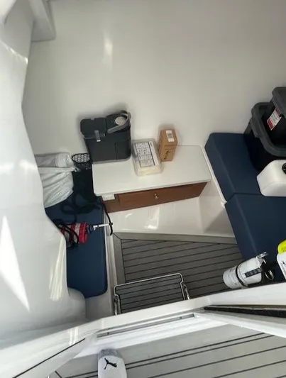  Yacht Photos Pics Interior cabin of 2022 Southport 33 DC boat with seating and storage.