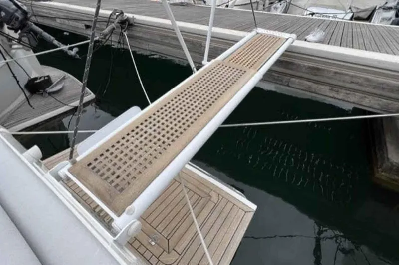 Ocilo Yacht Photos Pics Boarding plank on 2005 Sealine SC 39 yacht at dockside.