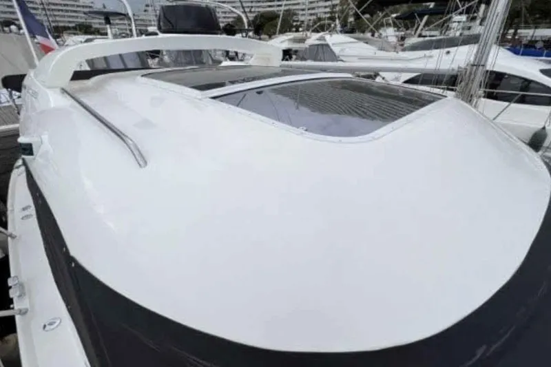 Ocilo Yacht Photos Pics 2005 Sealine SC 39 yacht with sleek white exterior and modern design.
