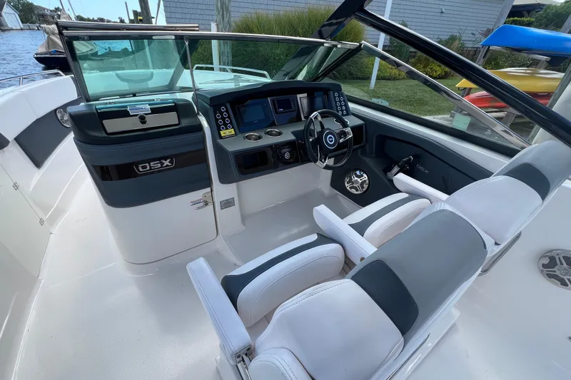  Yacht Photos Pics 2020 Chaparral 280 OSX boat interior with modern dashboard and seating.