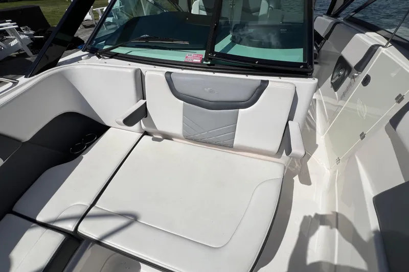 Yacht Photos Pics 2020 Chaparral 280 OSX boat interior with white seating and windshield.