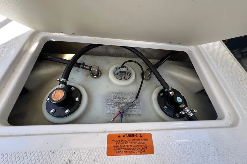  Yacht Photos Pics Fuel system components of a 2020 Chaparral 280 OSX boat with warning label.