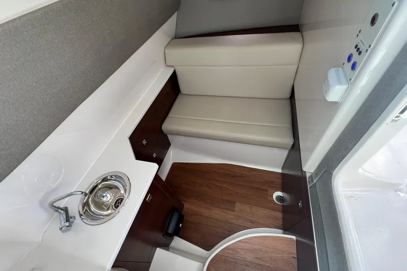  Yacht Photos Pics Interior of 2020 Chaparral 280 OSX boat with sink and seating area.