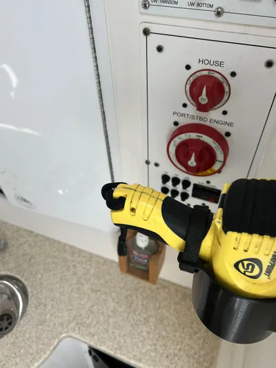 Angler Management Yacht Photos Pics Control panel of a 2013 Regulator 34 Center Console boat with safety equipment.