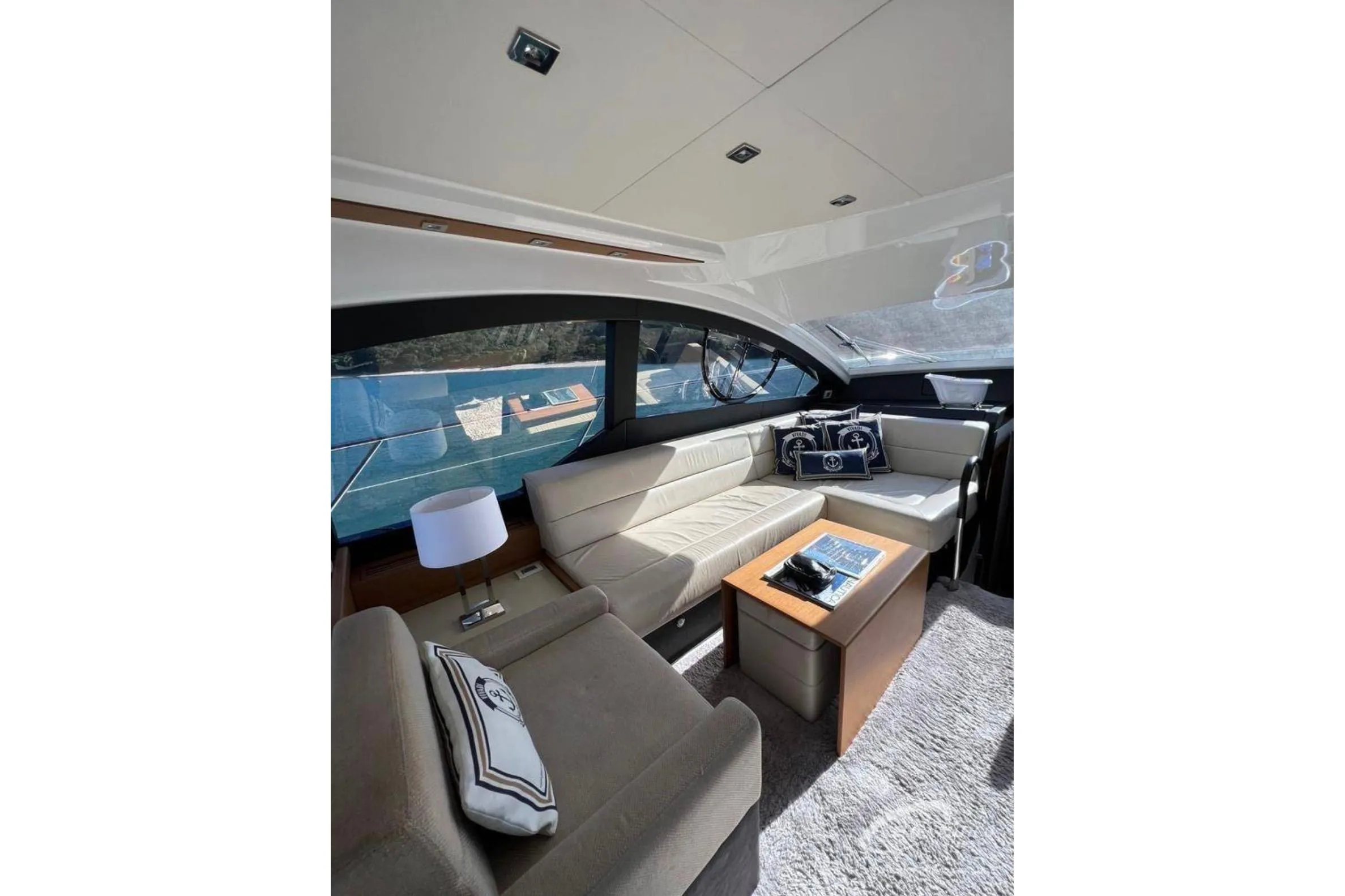 Luxurious interior of 2017 Schaefer 56 yacht with elegant seating and modern decor.