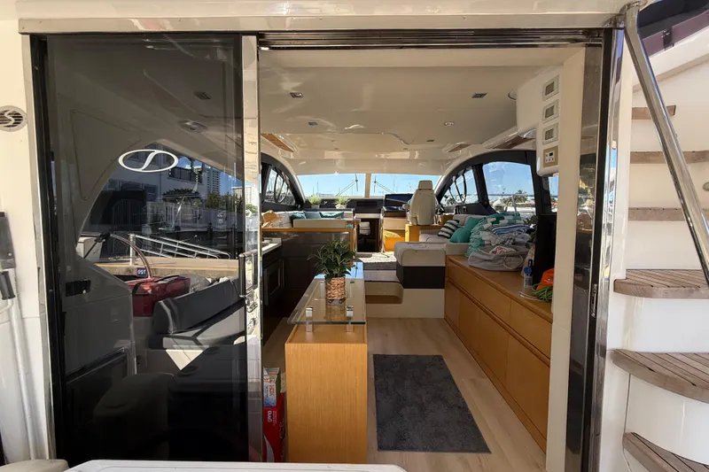  Yacht Photos Pics Luxurious interior of 2017 Schaefer 56 yacht with modern furnishings and elegant design.