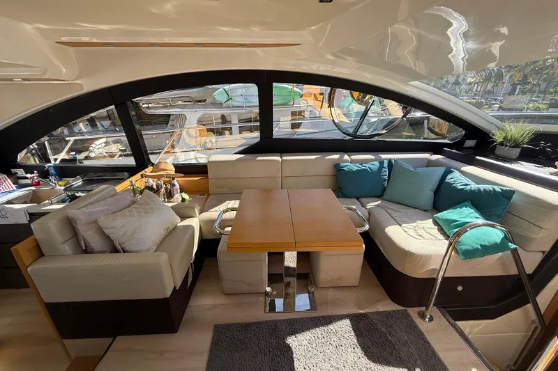  Yacht Photos Pics Luxurious interior of a 2017 Schaefer 56 yacht with elegant seating and decor.