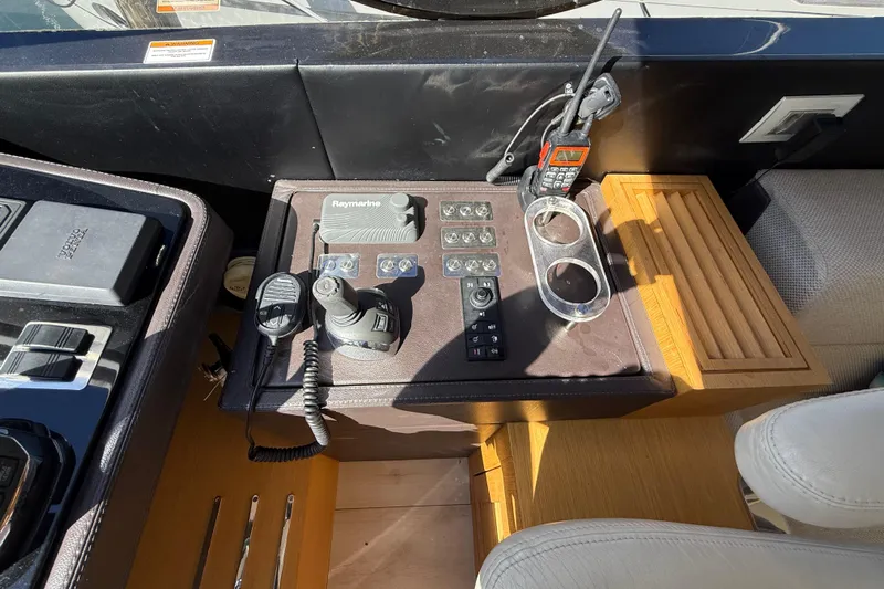  Yacht Photos Pics Control panel of a 2017 Schaefer 56 yacht with navigation and communication equipment.