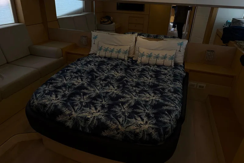  Yacht Photos Pics Luxurious Schaefer 56 yacht bedroom interior, 2017 model, with palm-themed bedding.