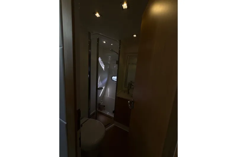  Yacht Photos Pics Bathroom interior of 2017 Schaefer 56 yacht with modern fixtures and lighting.