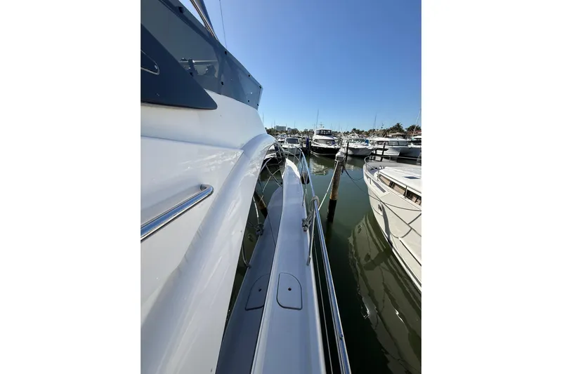  Yacht Photos Pics Schaefer 56 yacht docked in marina, 2017 model, sunny day, calm waters.