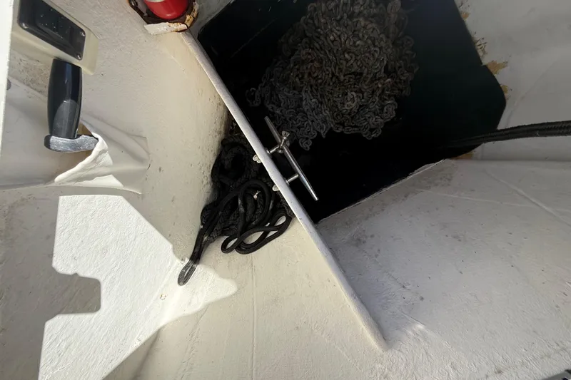  Yacht Photos Pics Storage compartment on a 2017 Schaefer 56 yacht with ropes and chains.
