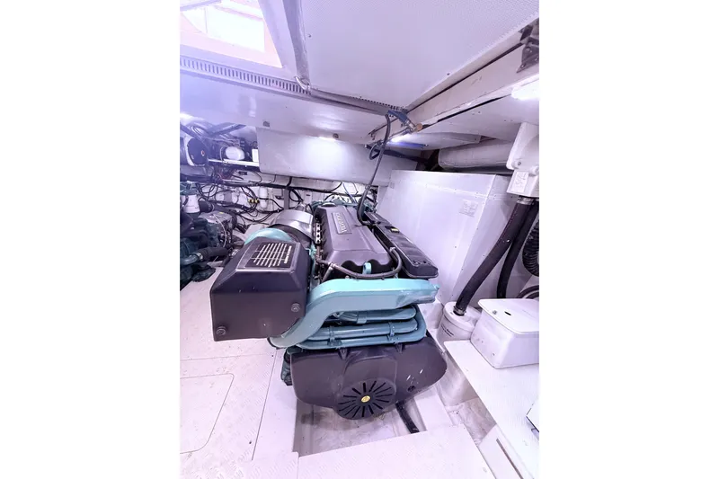  Yacht Photos Pics Engine room of 2017 Schaefer 56 yacht, showcasing a well-maintained engine setup.