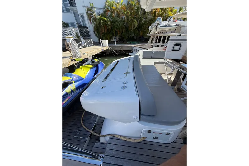  Yacht Photos Pics 2017 Schaefer 56 yacht docked with jet ski nearby.