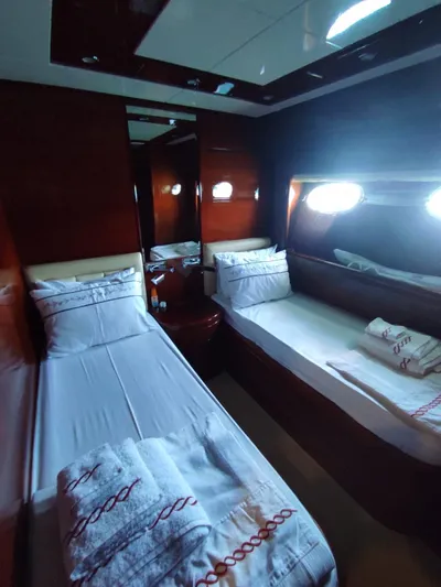  Yacht Photos Pics Twin cabin interior of 2005 Posillipo Technama 80 yacht with modern furnishings.