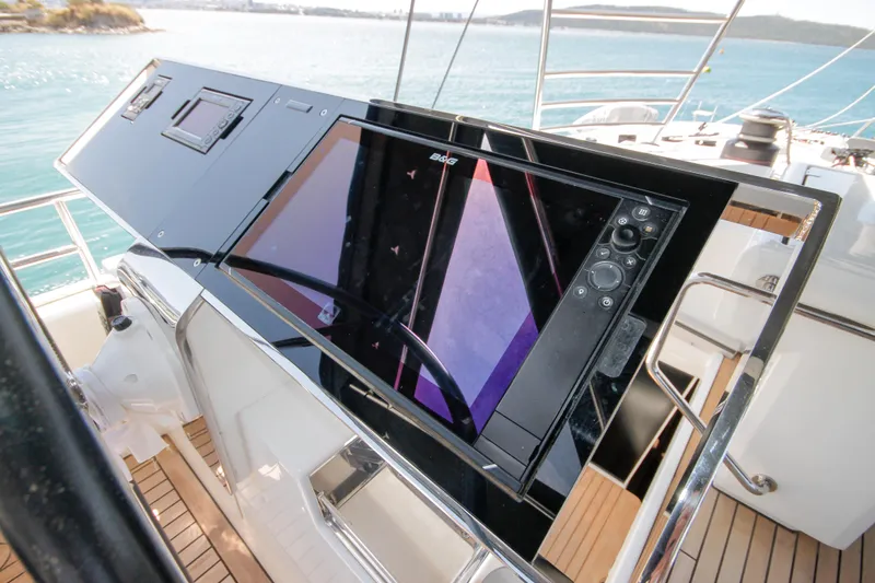  Yacht Photos Pics Control panel of 2019 Lagoon 620 Essense yacht with navigation display.