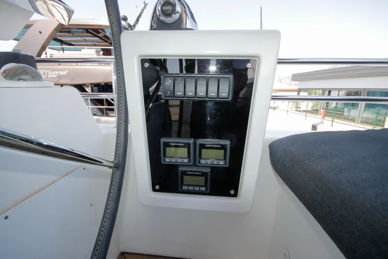  Yacht Photos Pics Control panel on a 2019 Lagoon 620 Essense yacht, featuring Volvo Penta displays.