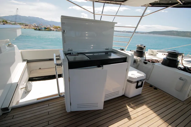  Yacht Photos Pics Outdoor kitchen on 2019 Lagoon 620 Essense yacht with ocean view.