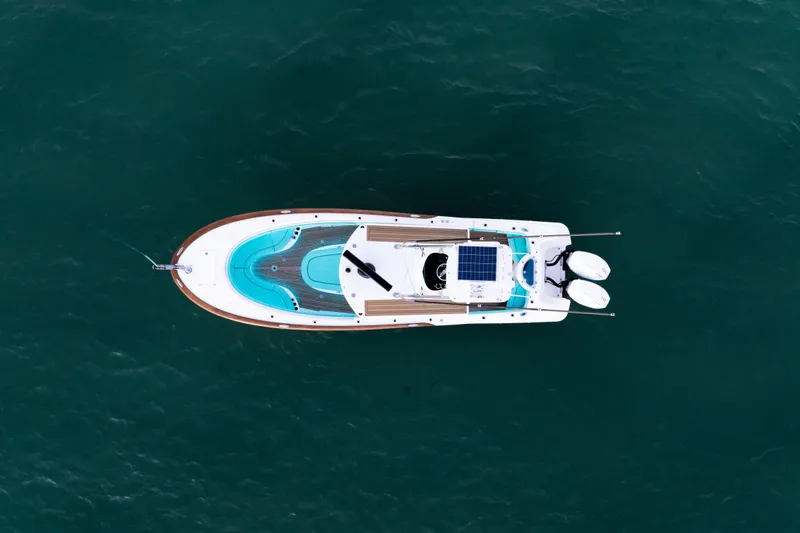 Toto II Yacht Photos Pics Overhead view of 2019 Mag Bay 33 CC boat on open water.