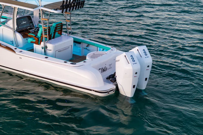 Toto II Yacht Photos Pics 2019 Mag Bay 33 CC boat with dual 400 V10 engines on water.