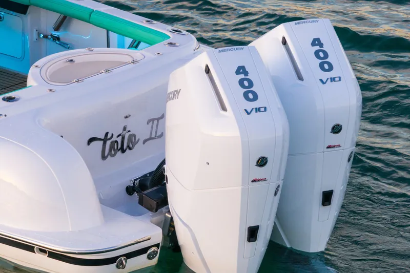 Toto II Yacht Photos Pics 2019 Mag Bay 33 CC boat with twin Mercury 400 V10 engines on water.