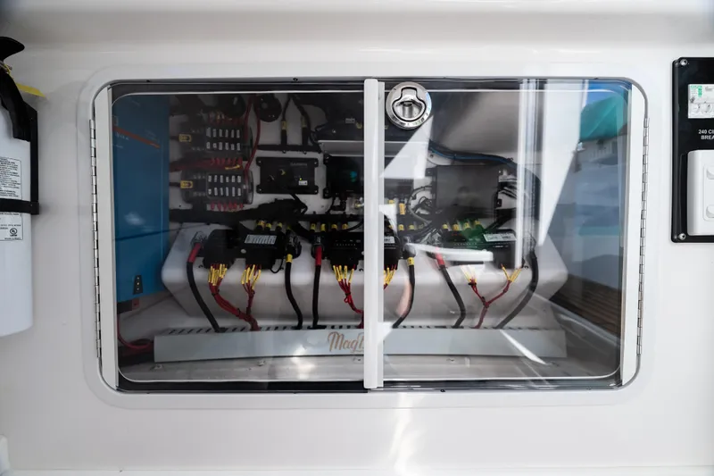 Toto II Yacht Photos Pics Electrical panel of 2019 Mag Bay 33 CC boat with wiring and components.