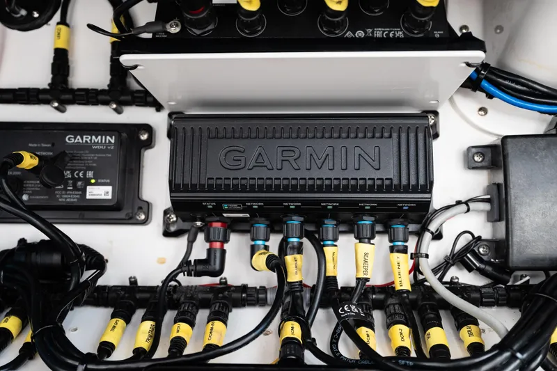 Toto II Yacht Photos Pics Garmin electronics system in 2019 Mag Bay 33 CC boat, showcasing wiring and connections.
