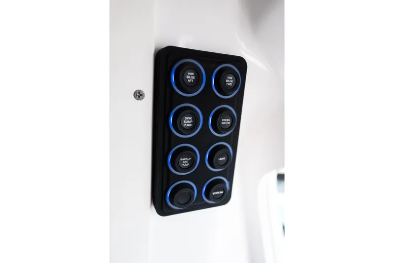 Toto II Yacht Photos Pics Control panel on 2019 Mag Bay 33 CC boat with labeled buttons.