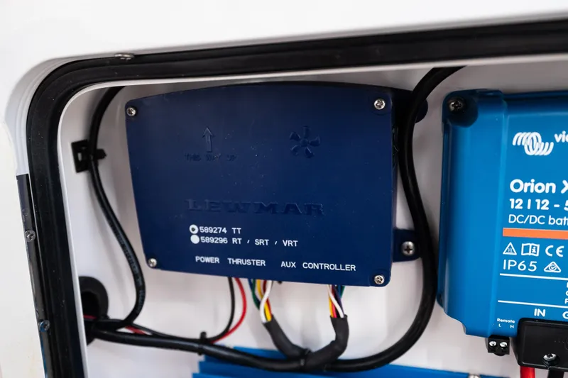 Toto II Yacht Photos Pics Electrical components inside a 2019 Mag Bay 33 CC boat, featuring Lewmar and Orion equipment.