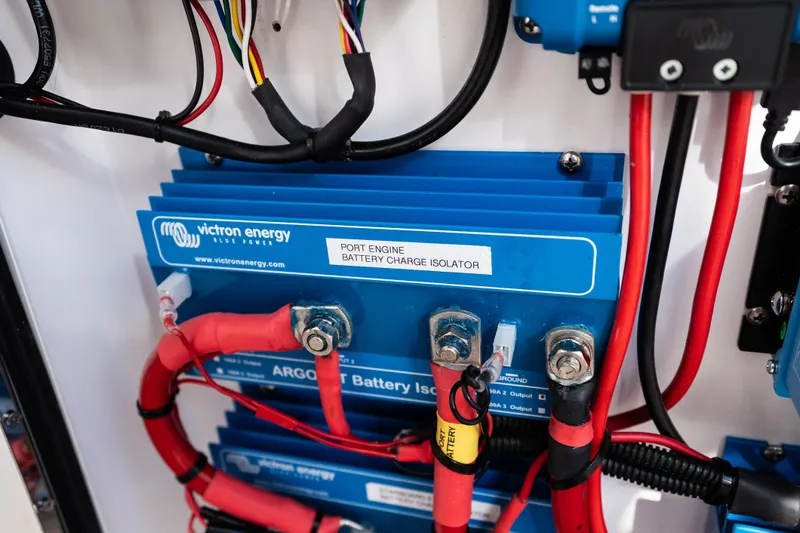 Toto II Yacht Photos Pics Battery charge isolator in 2019 Mag Bay 33 CC boat, featuring Victron Energy components.